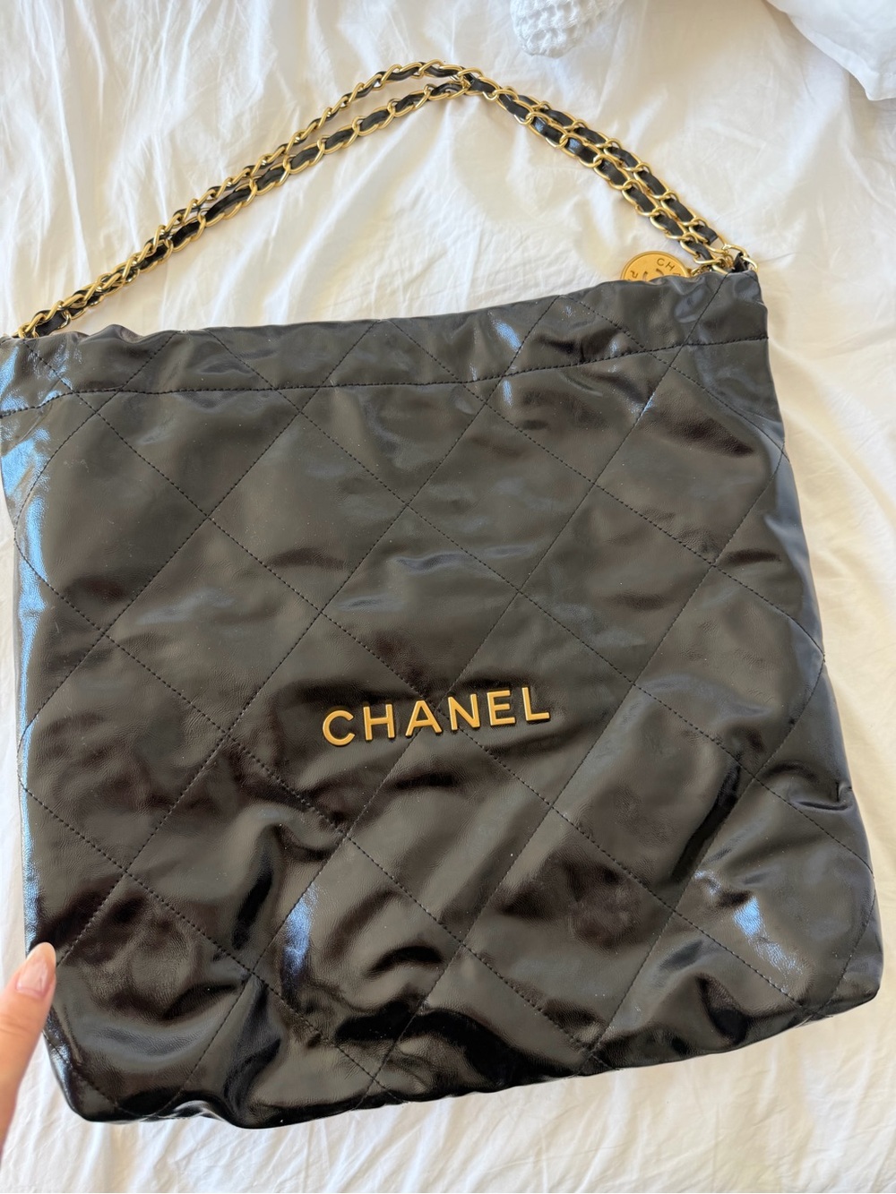 CHANEL Black Quilted Shoulder Bag with Gold Chain
